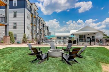 Community greenspace with fire pits and outdoor games